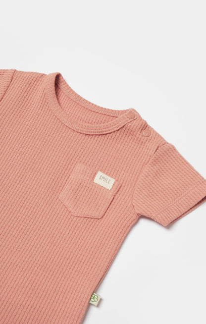 Waffle Smile Kurzarmbody - Coral